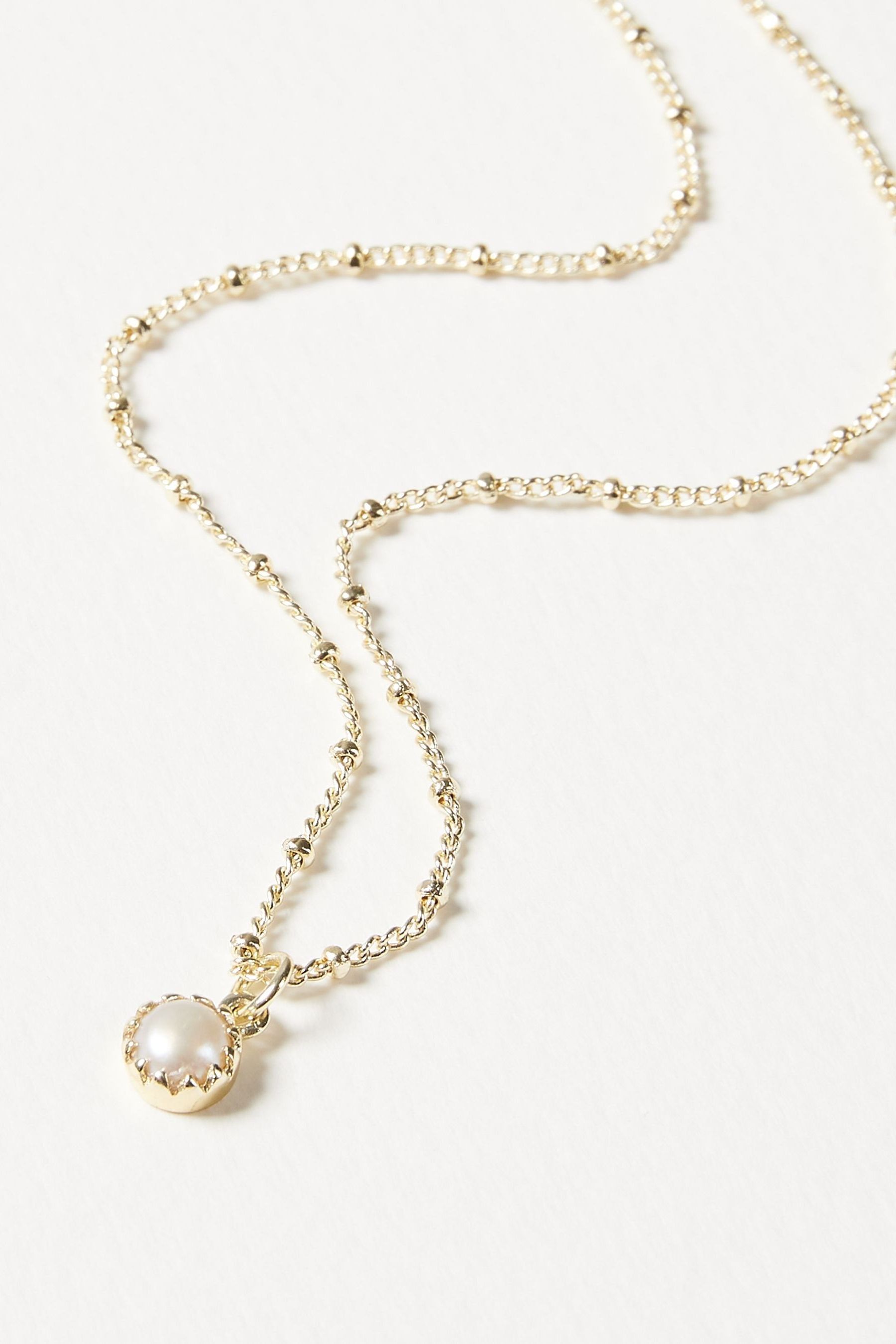 Buy Oliver Bonas Alula Round Pearl Drop Gold Plated Pendant Necklace from the Next UK online shop