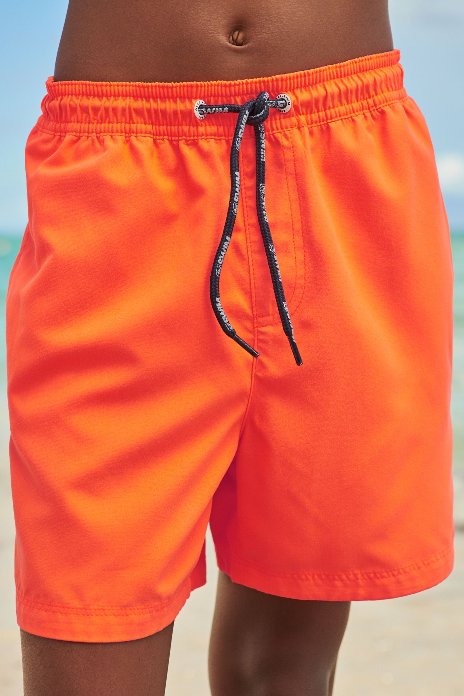 buy-orange-swim-shorts-1-5-16yrs-from-the-next-uk-online-shop