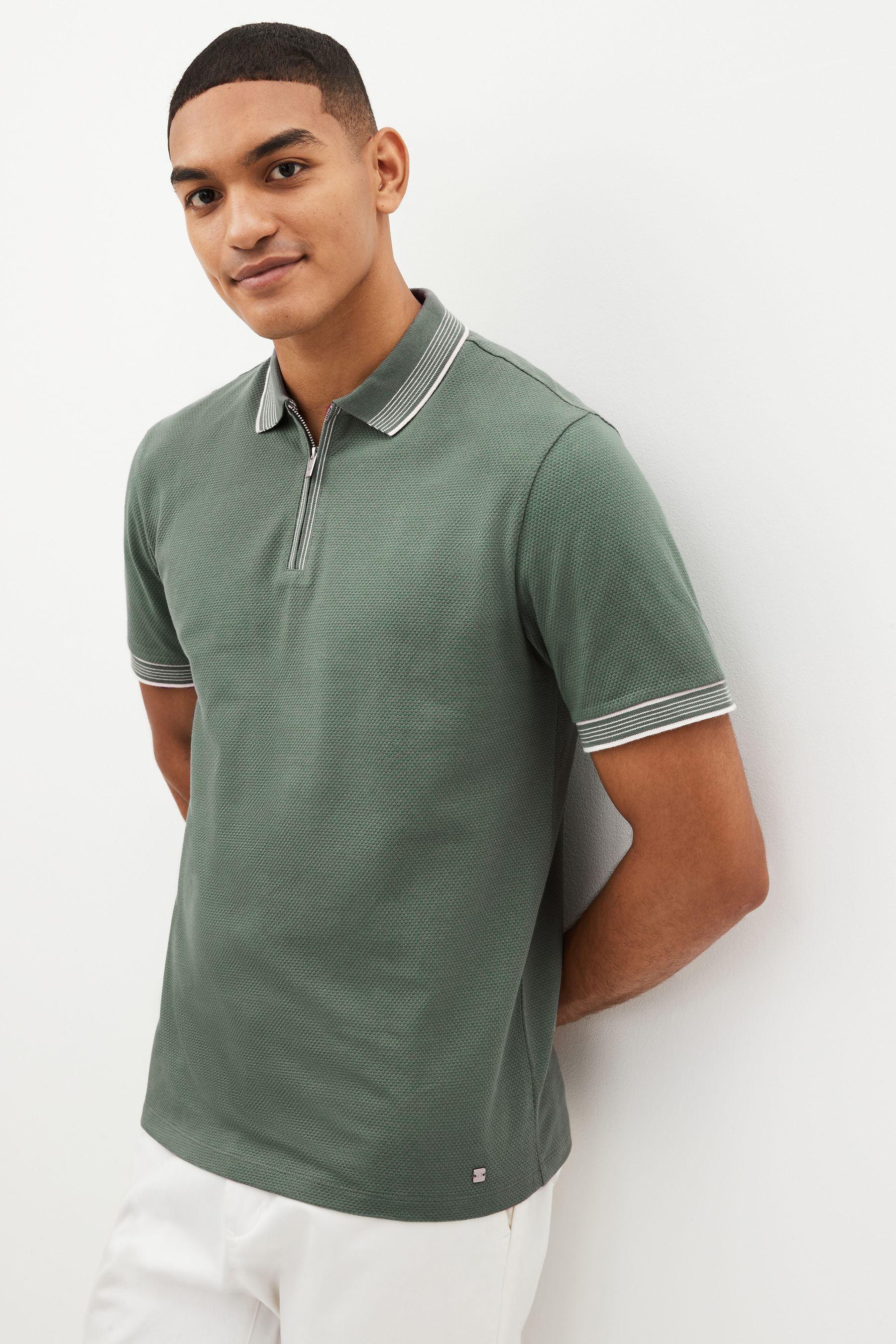 Buy Sage Green Tipped Textured Polo Shirt from the Next UK online shop