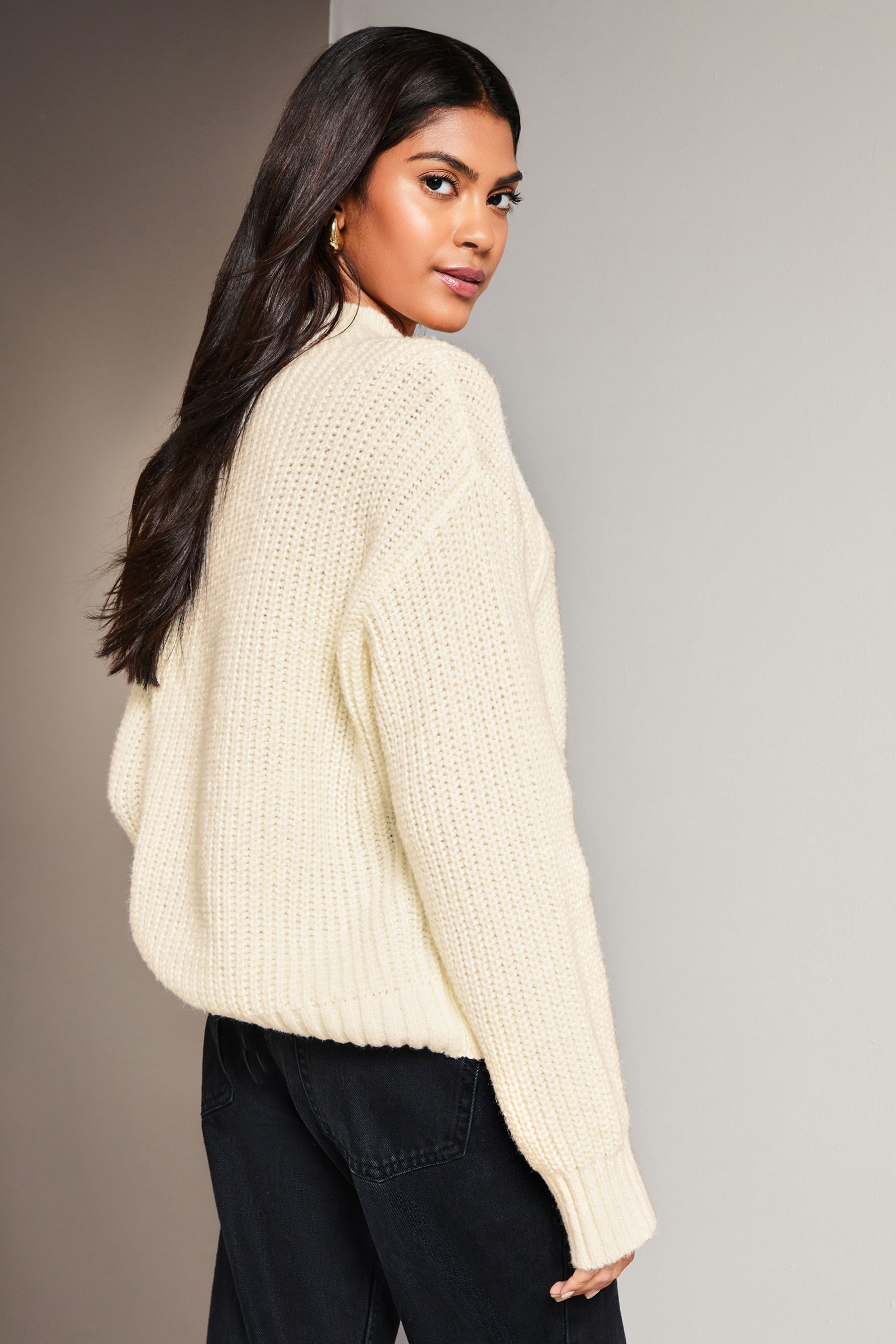 Buy Lipsy Ivory White Cosy High Neck Rib Cable Knitted Jumper from Next ...