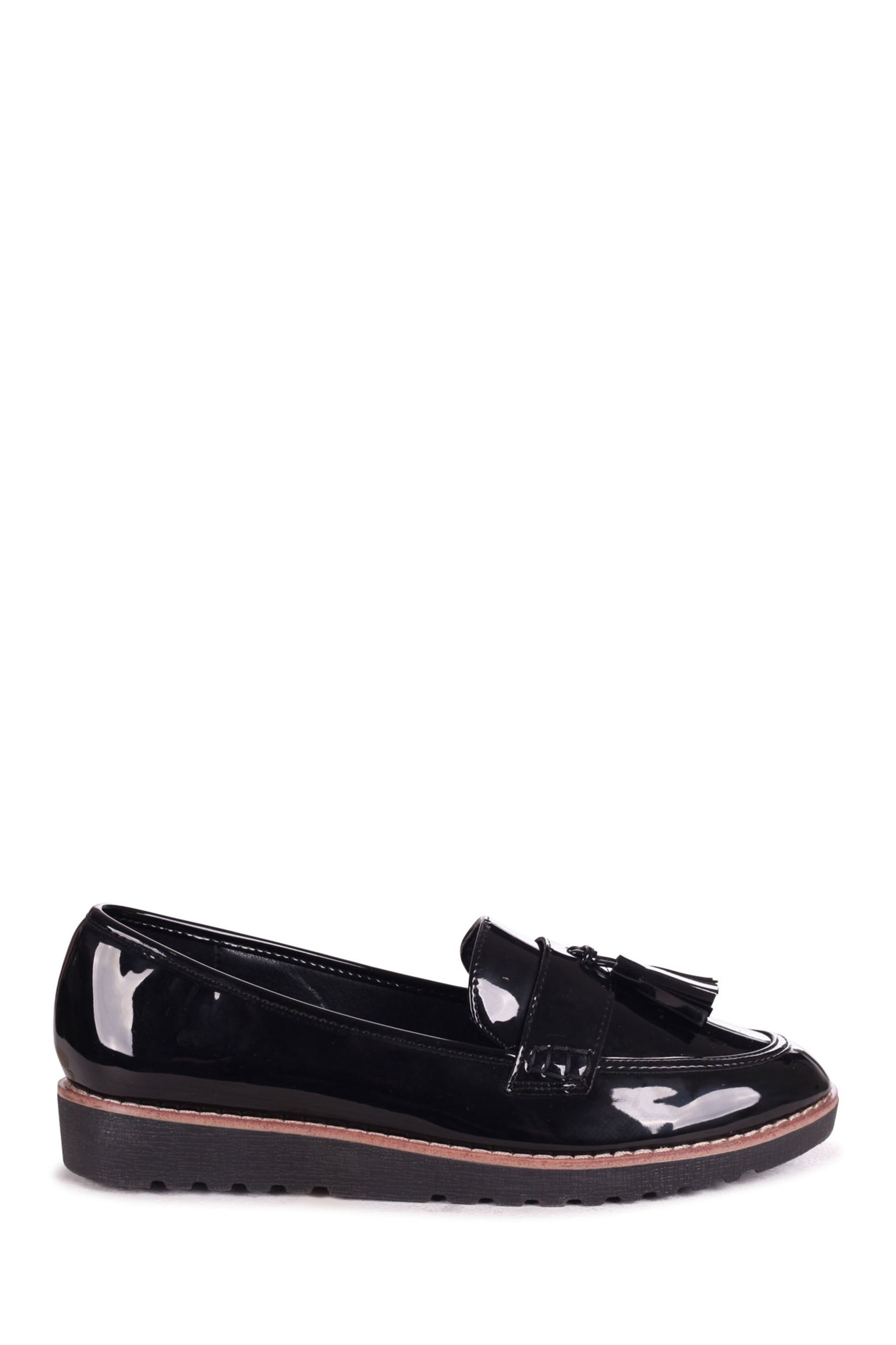 Buy Linzi Black Patent Samson SlipOns Loafers With Tassle Trim from