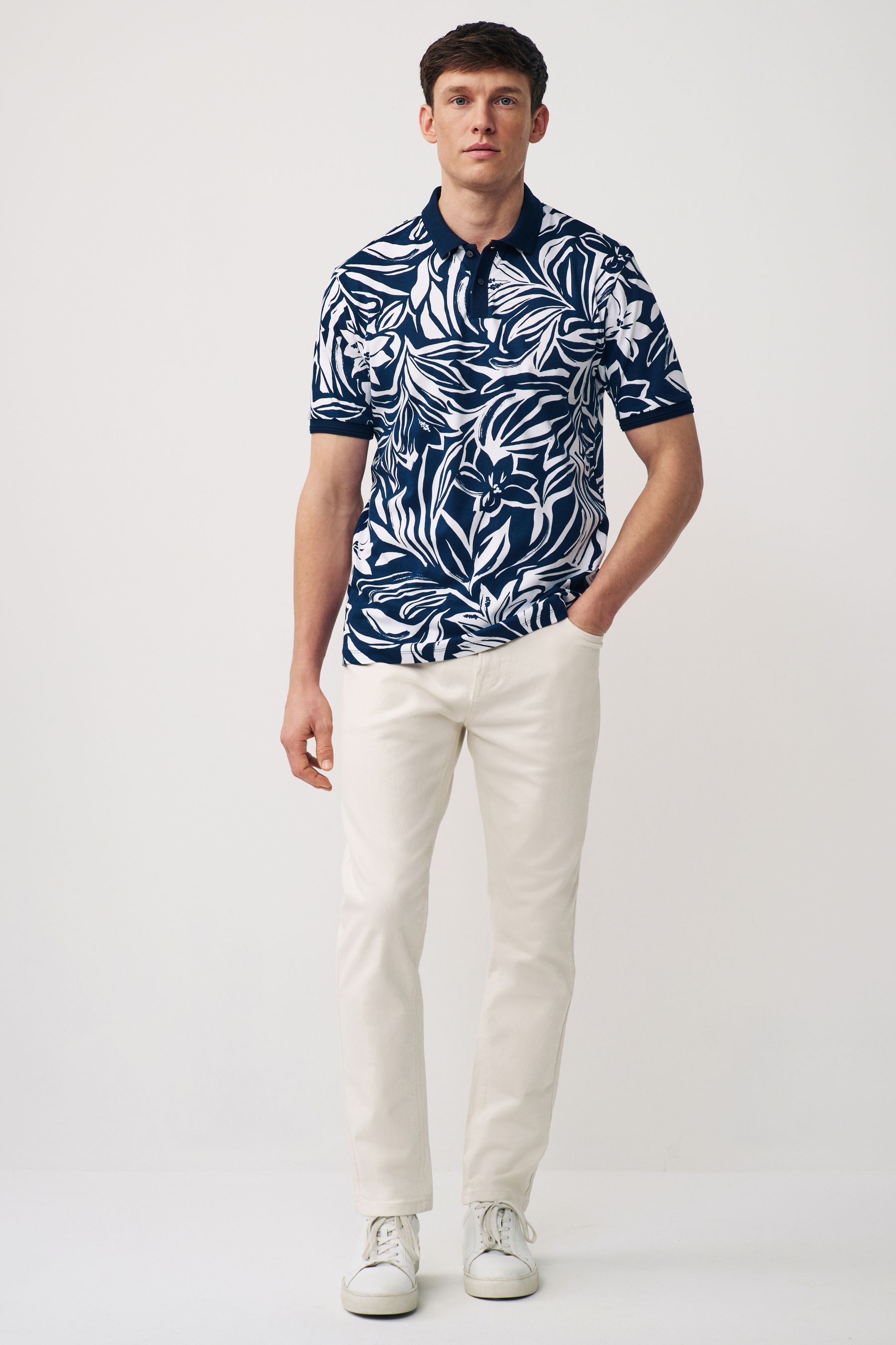 Buy Navy Leaf Short Sleeve Print Polo Shirt from the Next UK online shop