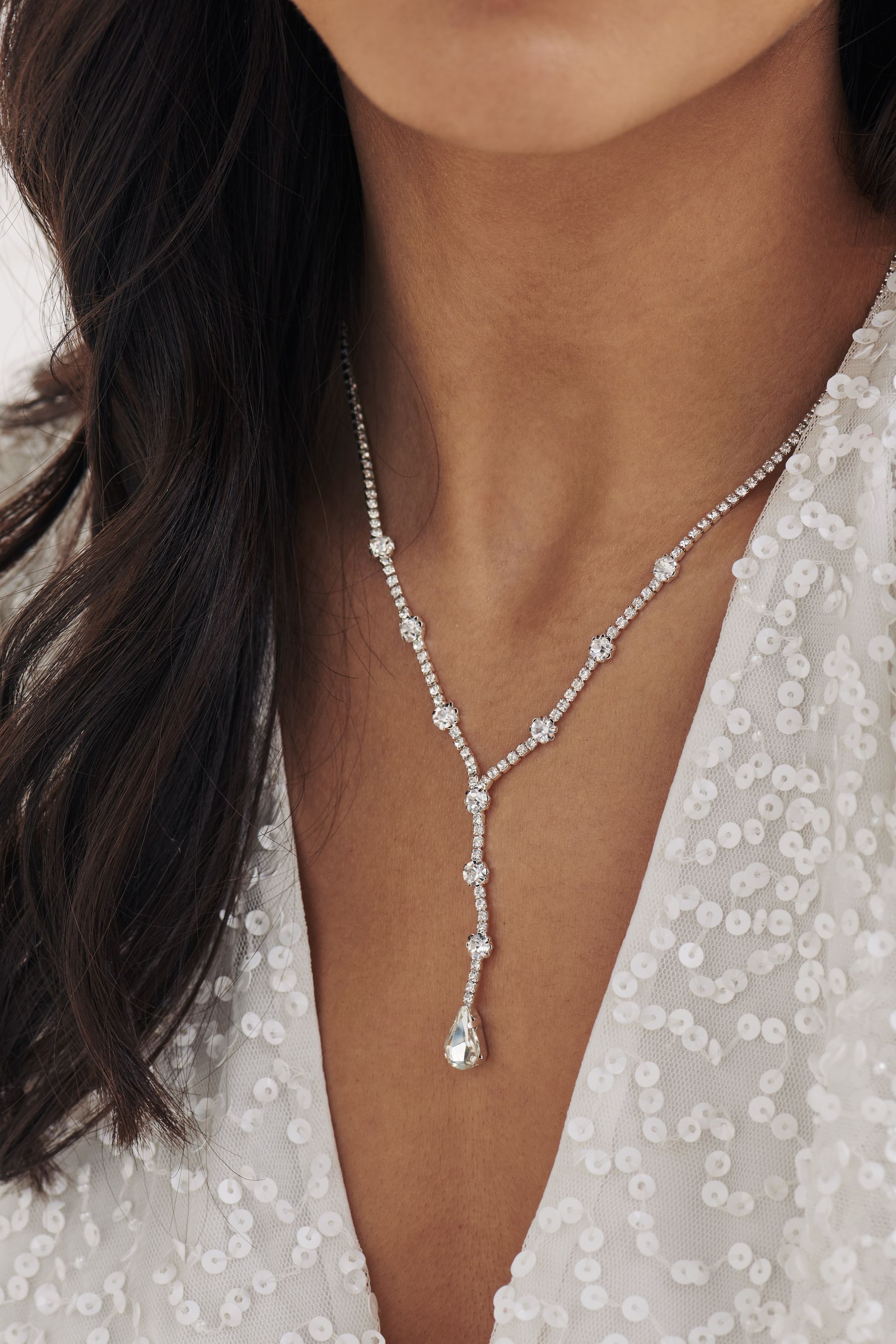 Buy Silver Tone Crystal Y Drop Necklace from the Next UK online shop