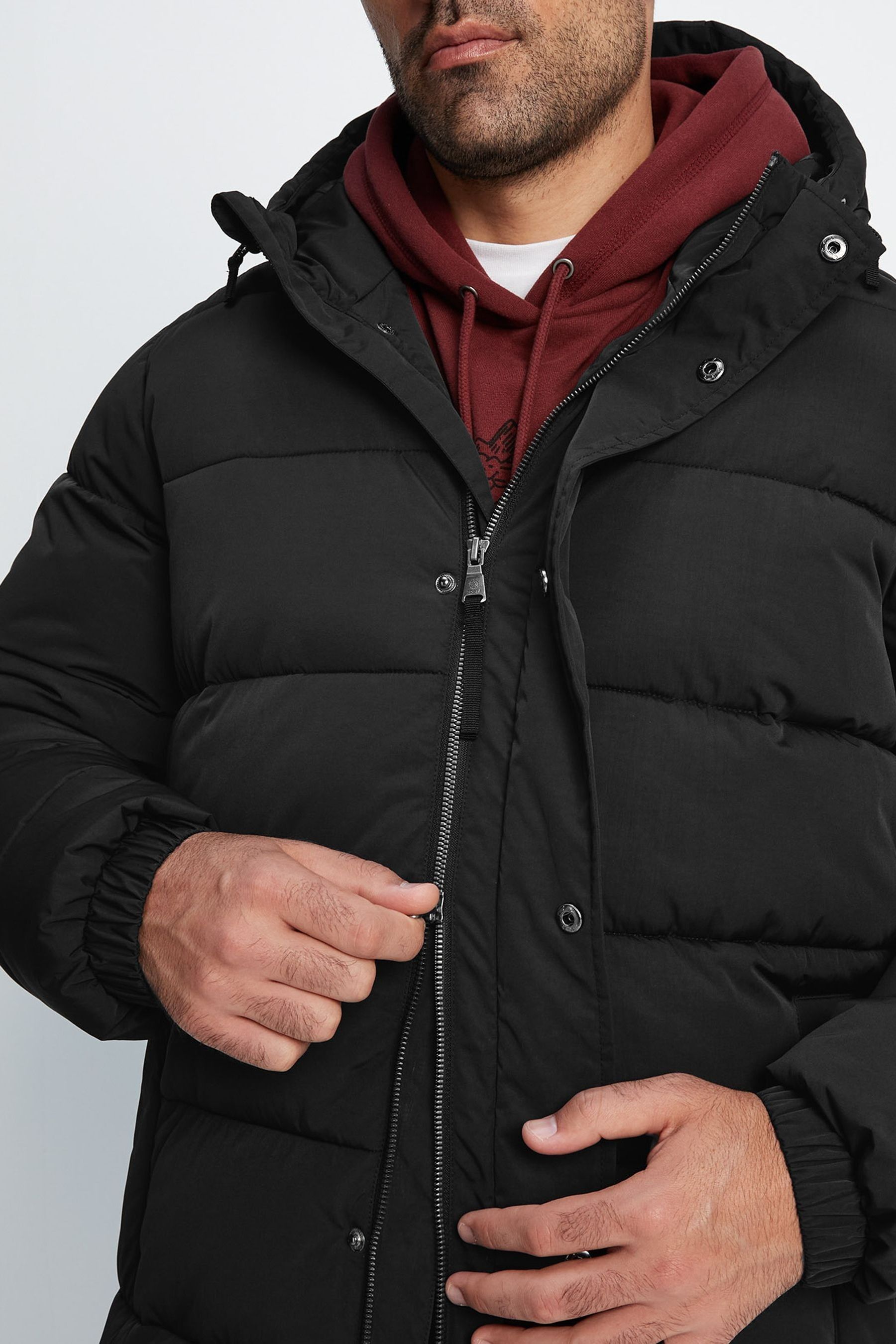 Buy Tog 24 Mens Langrick Long Padded Black Jacket from Next Ireland