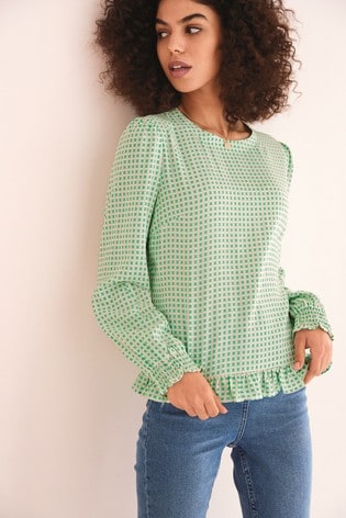 ruffle hem long sleeve top