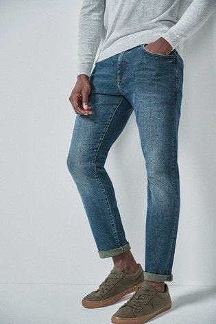 green slim fit jeans