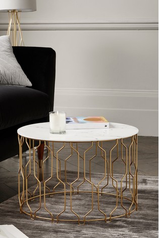 Buy Ella Gold Coffee Table From The Next Uk Online Shop With its unique white marble top and refined lines, the marble square coffee table will create a mineral elegant and discreet, the marble is surrounded by a black metal frame creating a cute contrast and a more contemporary look. ella gold coffee table