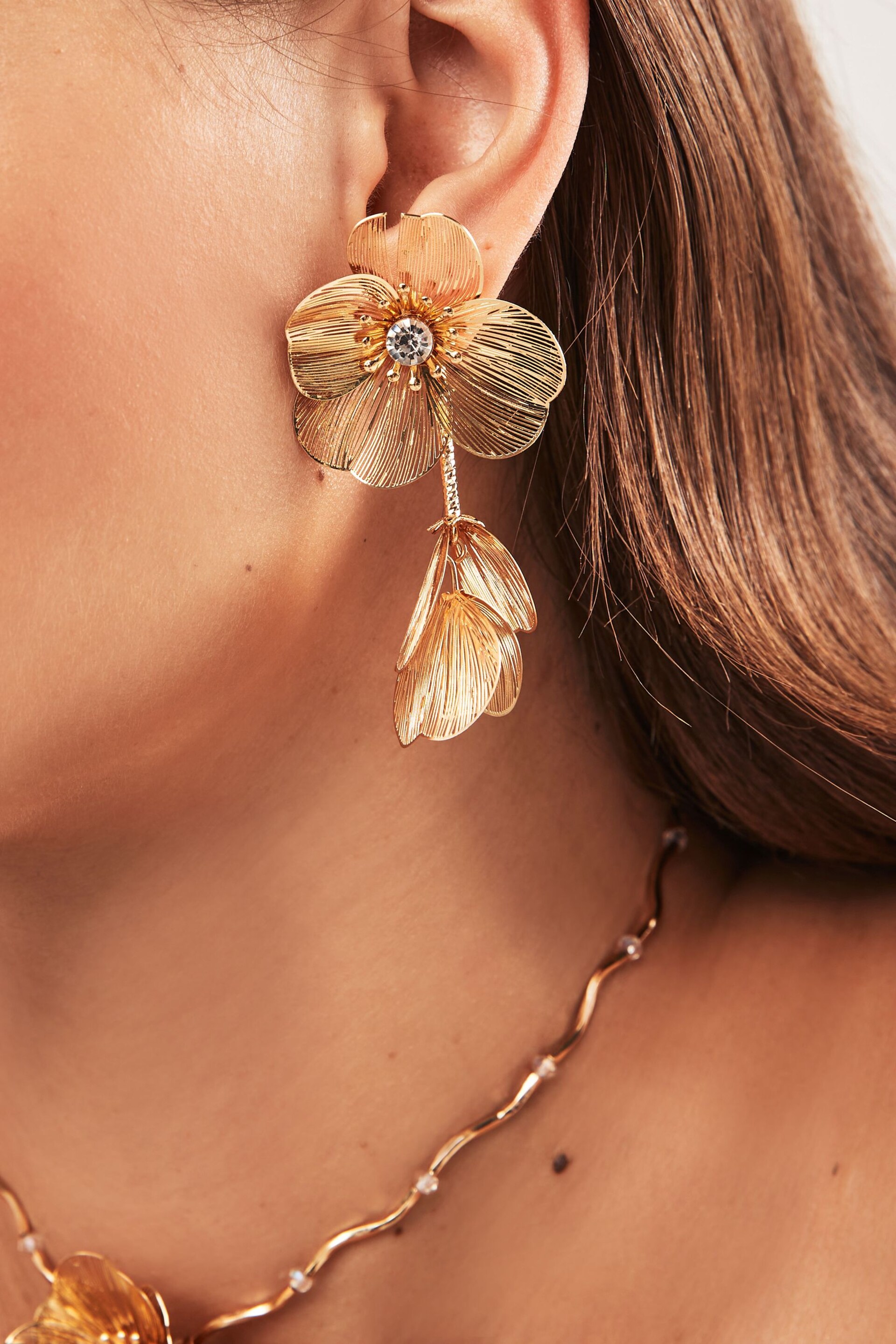 Gold Tone Flower Drop Statement Earrings - Image 1 of 3