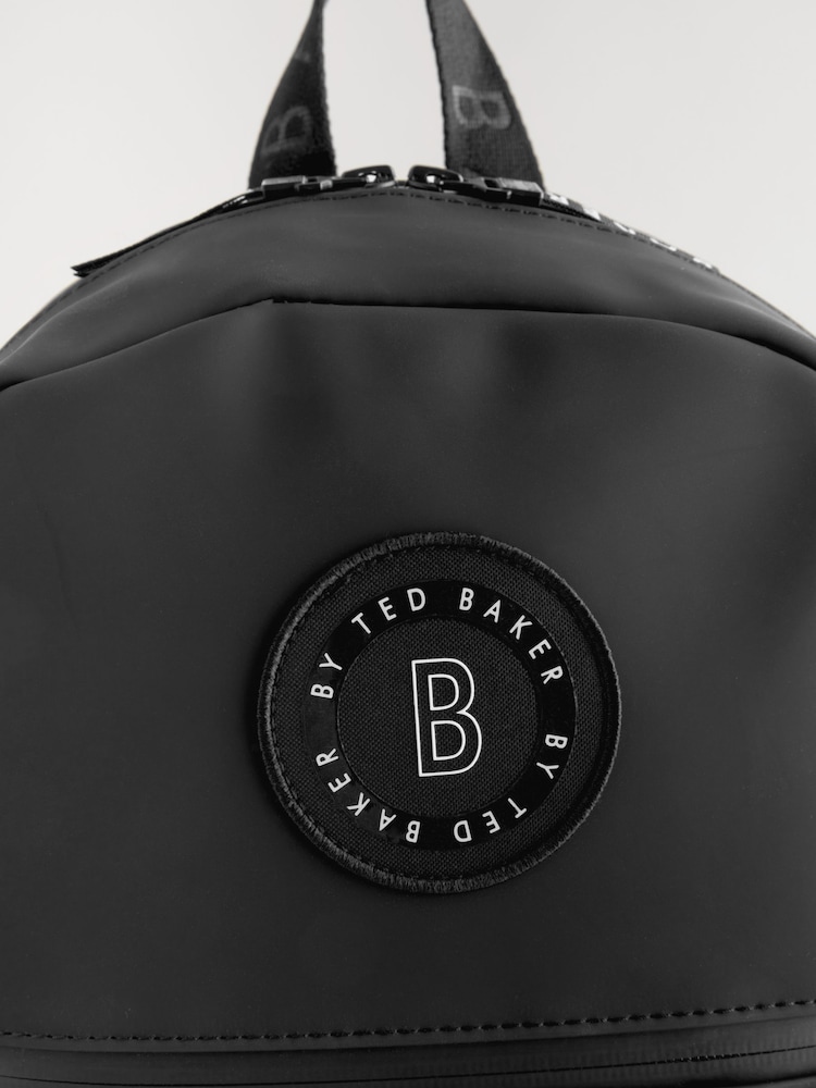 NEW Ted Baker Black Embossed Logo Vegan Leather Travel Backpack Ted Baker Voella Logo-embossed Faux-leather Backpack in  main image 4
