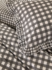 Juego de funda de edredón y funda de almohada a cuadros vichy con volantes de Vantona - Imagen 4 de 5