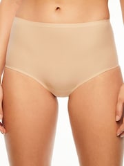 Nude - Pantalones de cintura alta sin costuras elásticos con diseño suave de Chantelle - Imagen 1 de 3