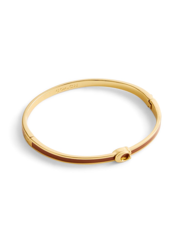 COACH Gold Tone Signature C Enamel Bangle Bracelet - Image 1 of 4 COACH Gold Tone Signature C Enamel Bangle Bracelet - Image 1 of 4