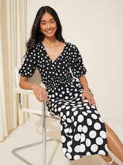 Friends Like These Black/White Puff Sleeve Ruched Waist V Neck Midi Summer Dress - Image 3 of 4
