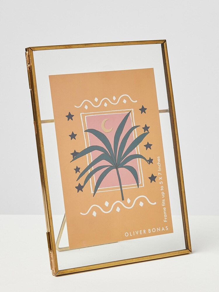 Oliver Bonas Gold/Glass Standing Portrait 5 x 7 Photo Frame - Image 1 of 3 Oliver Bonas Gold/Glass Standing Portrait 5 x 7 Photo Frame - Image 1 of 3