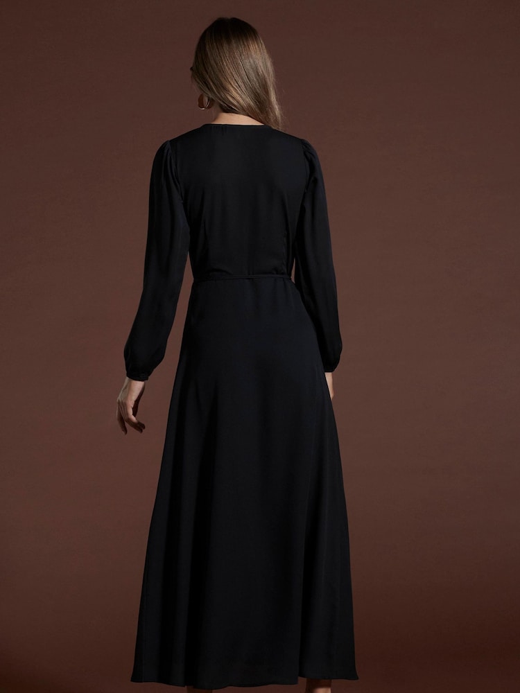 Schwarz - Tanzendes Jagger-Maxikleid mit Leopardenmuster - Bild 2 von 4 Schwarz - Tanzendes Jagger-Maxikleid mit Leopardenmuster - Bild 2 von 4