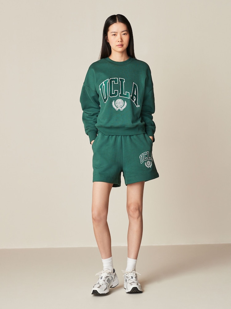 Green Licence UCLA Collegiate University Graphic Varsity Slogan Sweat Shorts - Image 1 of 6