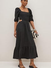 Schwarz - Strukturiertes Midikleid aus Jersey mit Zierausschnitt - Bild 1 von 4