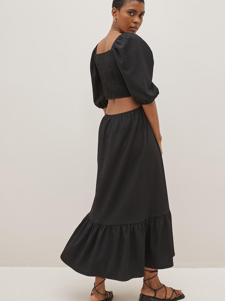 Schwarz - Strukturiertes Midikleid aus Jersey mit Zierausschnitt - Bild 2 von 4 Schwarz - Strukturiertes Midikleid aus Jersey mit Zierausschnitt - Bild 2 von 4