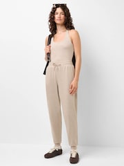 Sweaty Betty Nude Glow Studio Halterneck Tank Top - Image 1 of 6