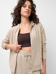 Sweaty Betty Nude Glow Studio Zip Up Hoodie - Image 1 of 6