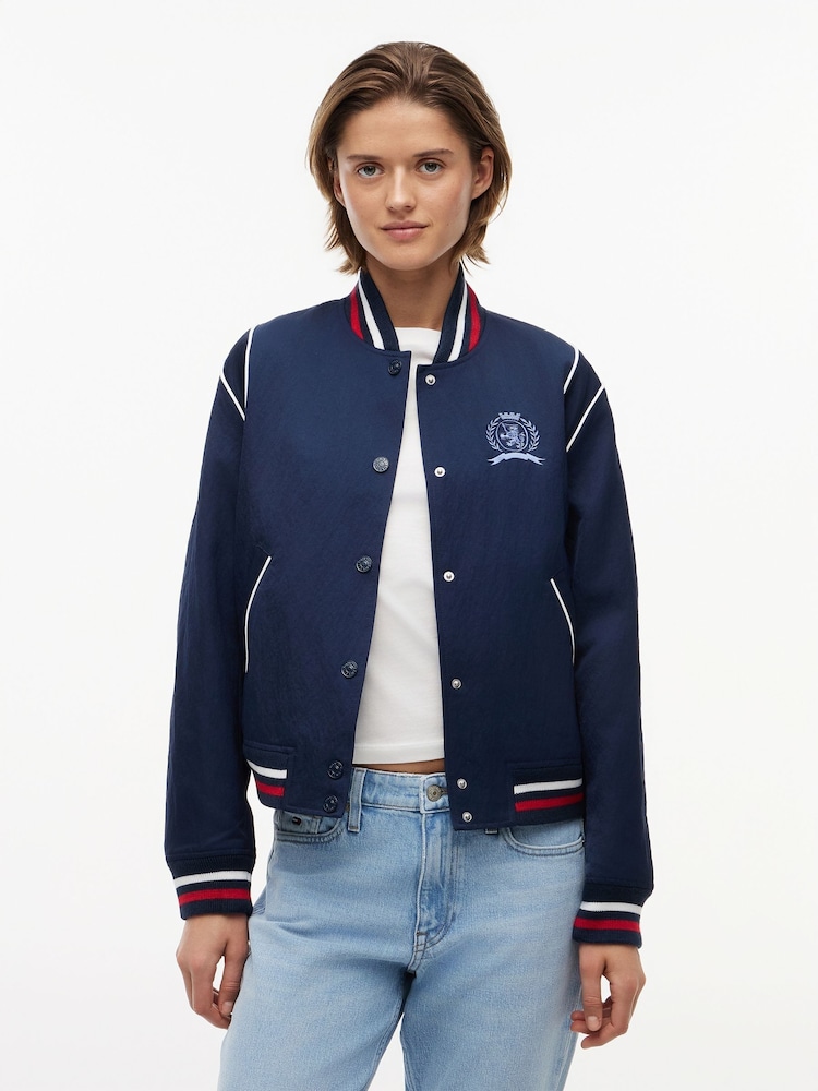 Tommy Jeans Blue Crest Embroidery Varsity Jacket - Image 1 of 5 Tommy Jeans Blue Crest Embroidery Varsity Jacket - Image 1 of 5