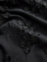 Schwarz - Bluse mit Schluppe und Blumenmuste - Bild 3 von 6