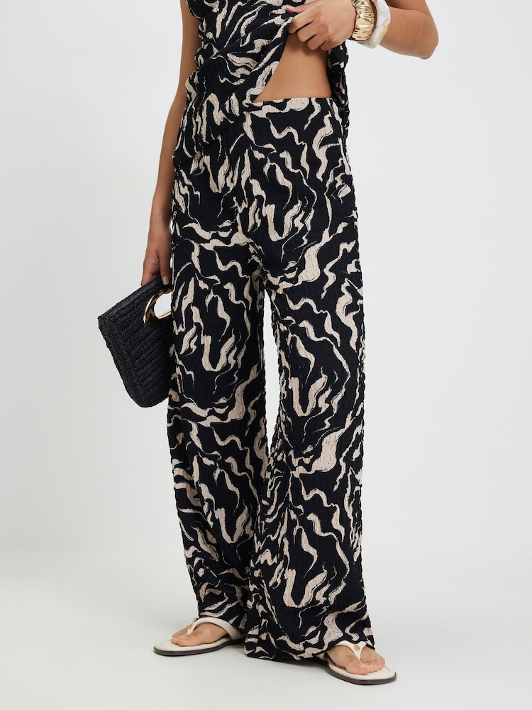 River Island Black Petite Abstract Print Wide Leg Joggers - Image 2 of 4 River Island Black Petite Abstract Print Wide Leg Joggers - Image 2 of 4