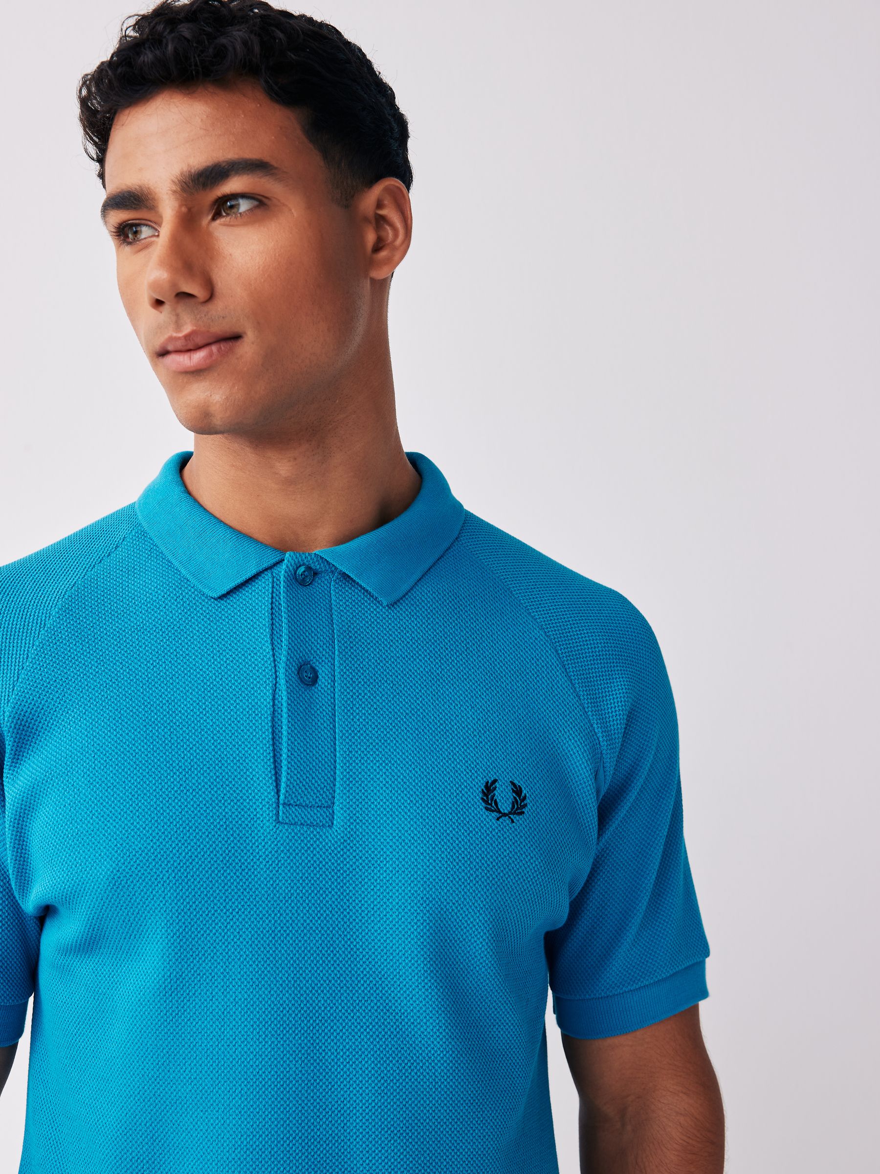 Buy Fred Perry Rib Detail Textured Polo Shirt from Next