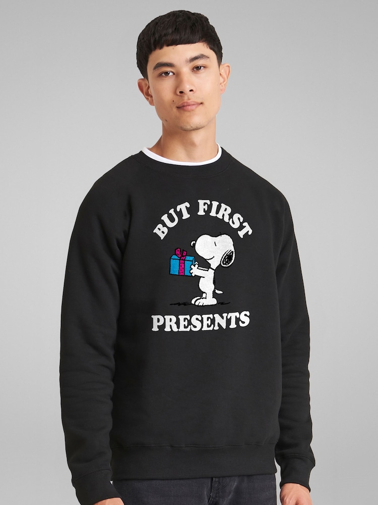 All + Every Black Peanuts Christmas But First Presents Snoopy Sweatshirt - Image 1 of 4