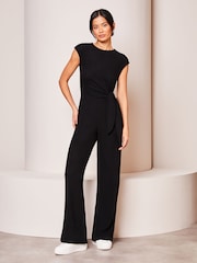 Lipsy Black Cosy Rib Sleeveless Tie Side Wide Leg Jumpsuit - Image 1 of 4