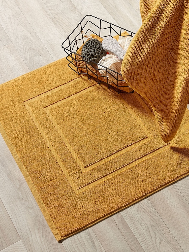 Christy Saffron Yellow Brixton 850GSM 100% Cotton Bath Mat - Image 1 of 2