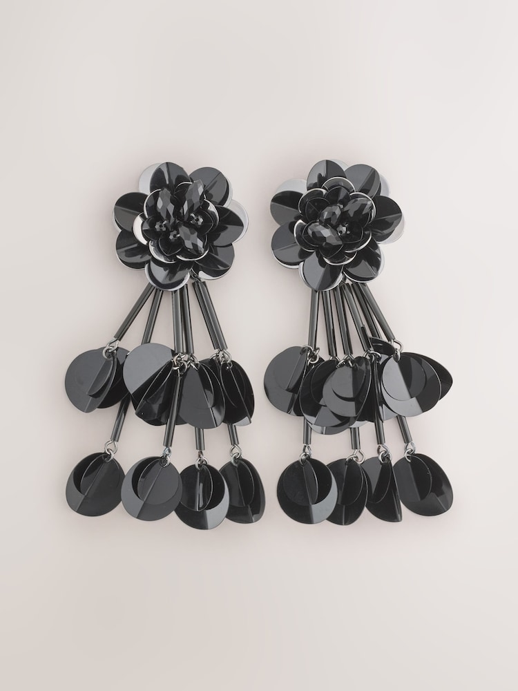 Schwarz - Statement-Blumenohrringe mit Pailletten - Bild 1 von 4 Schwarz - Statement-Blumenohrringe mit Pailletten - Bild 1 von 4