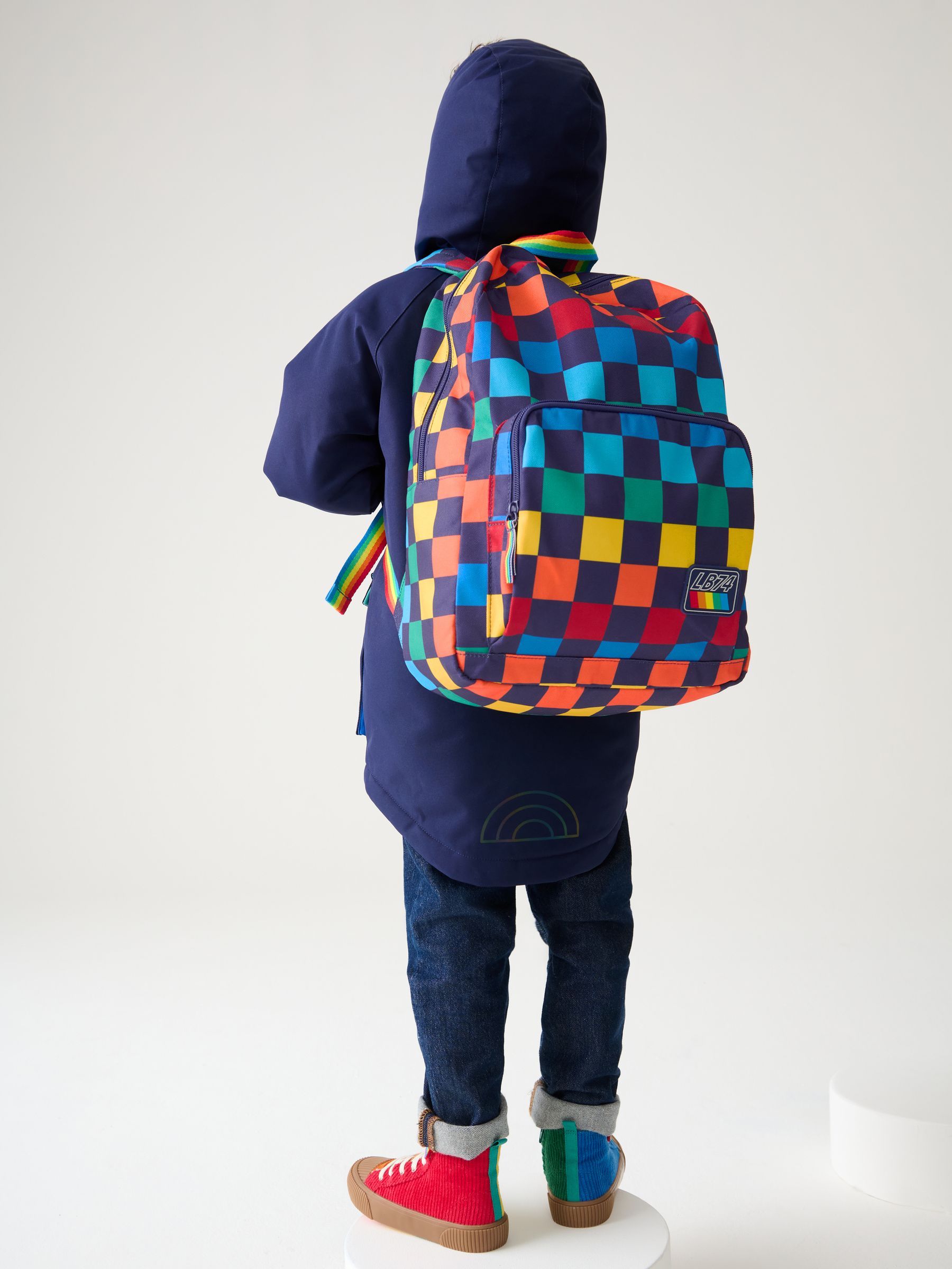 Rainbow checkerboard backpack deals