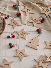 Set of 2 Red Wooden Star Alphabet Christmas Baubles - Image 1 of 3