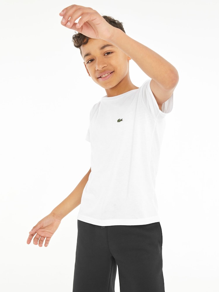 Lacoste Childrens Classic 100% Cotton T-Shirt - Image 1 of 4 Lacoste Childrens Classic 100% Cotton T-Shirt - Image 1 of 4