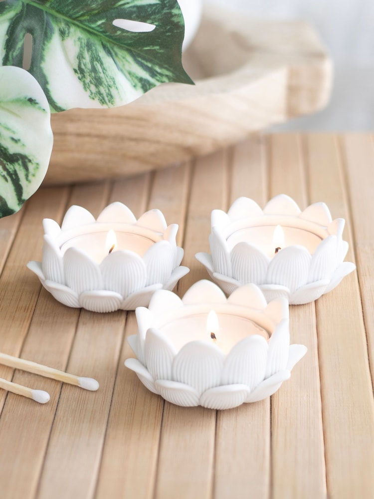 Something Different Set of 3 White White Lotus Flower Tealight Holders - Image 1 of 4 Something Different Set of 3 White White Lotus Flower Tealight Holders - Image 1 of 4