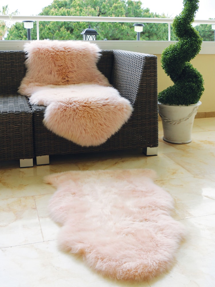 Origin Rug Collection. Blush Pink Peach Sheepskin Rug - Image 1 of 5