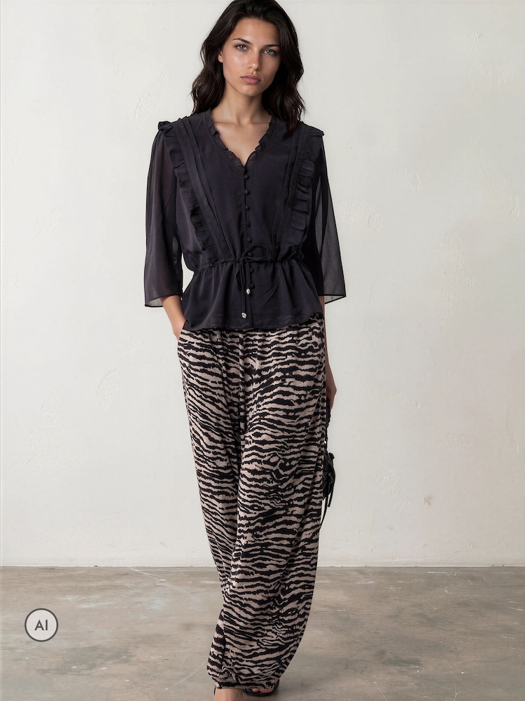 Religion Animal Loose Fitting Lyla Jersey Trousers Print With Cuffed Hem - Image 1 of 8 Religion Animal Loose Fitting Lyla Jersey Trousers Print With Cuffed Hem - Image 1 of 8