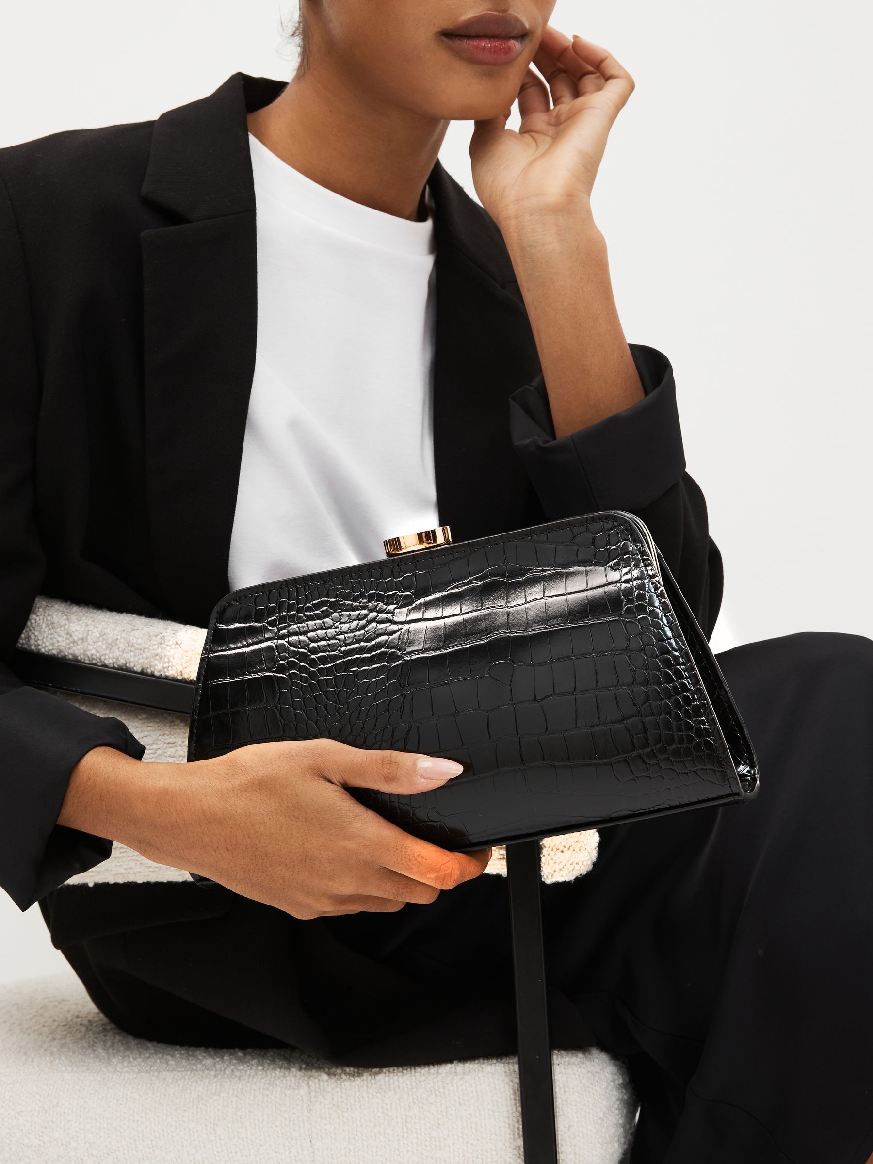 Croc clutch bag discount
