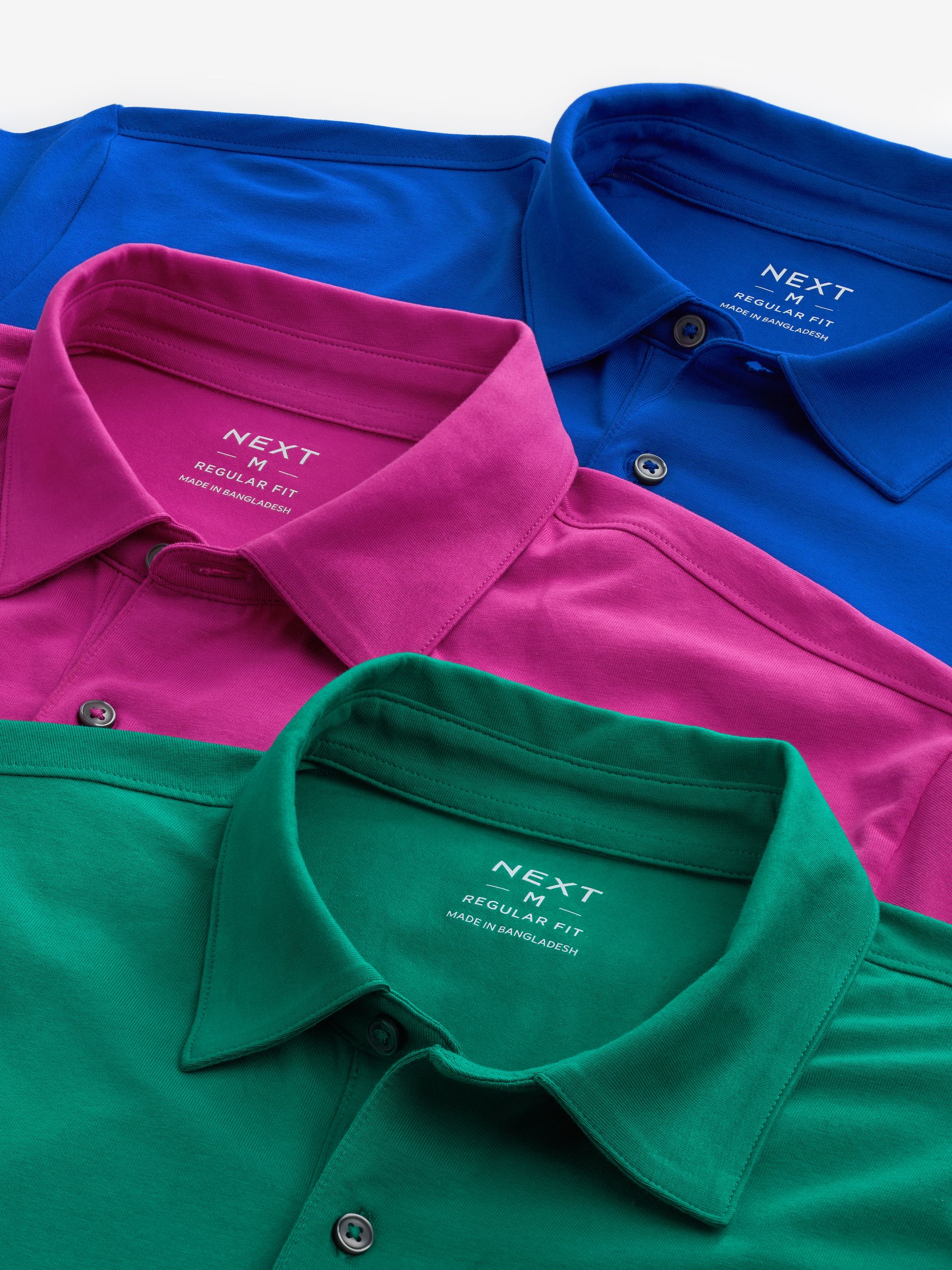 Buy Blue Green Pink Bright Regular Fit Short Sleeve Jersey Polo Shirts 3 Pack from Next Luxembourg