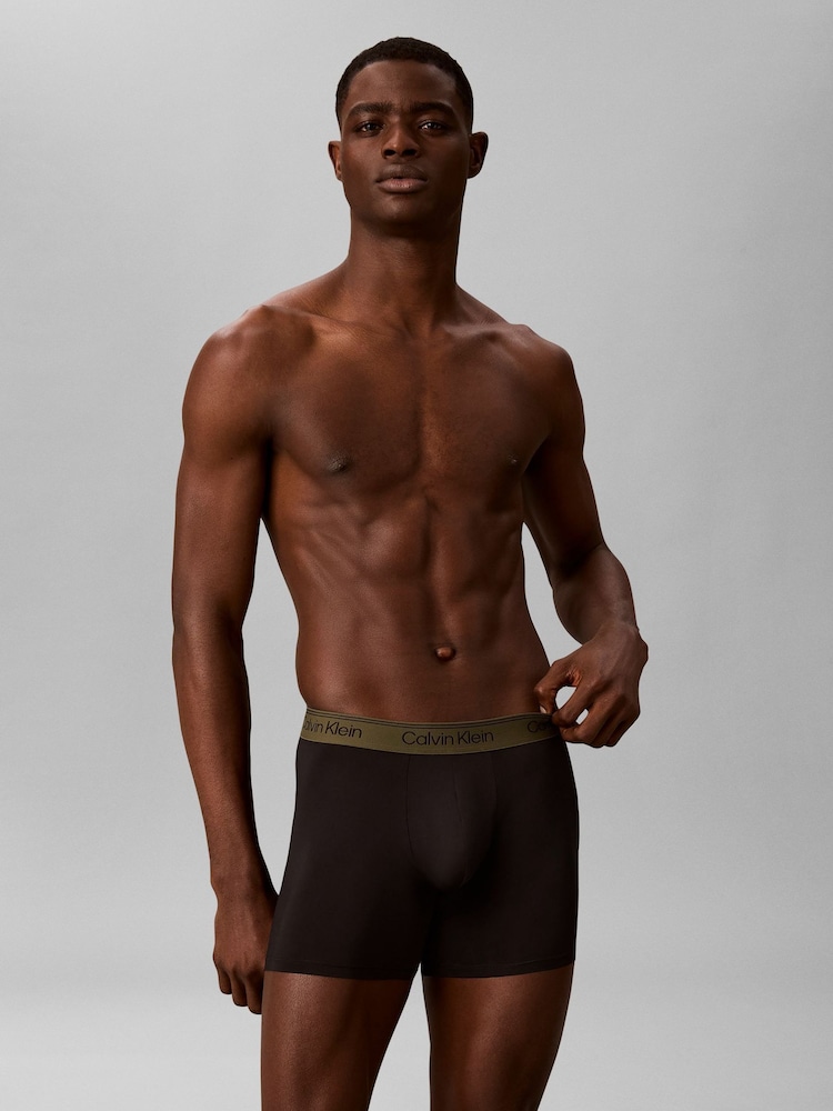 أسود/أخضر/برتقالي - حزمة من 3 ملابس داخلية بوكسر من Calvin Klein - نسيج مايكروفايبر قابل للتمدد - صورة 2 من 6 أسود/أخضر/برتقالي - حزمة من 3 ملابس داخلية بوكسر من Calvin Klein - نسيج مايكروفايبر قابل للتمدد - صورة 2 من 6