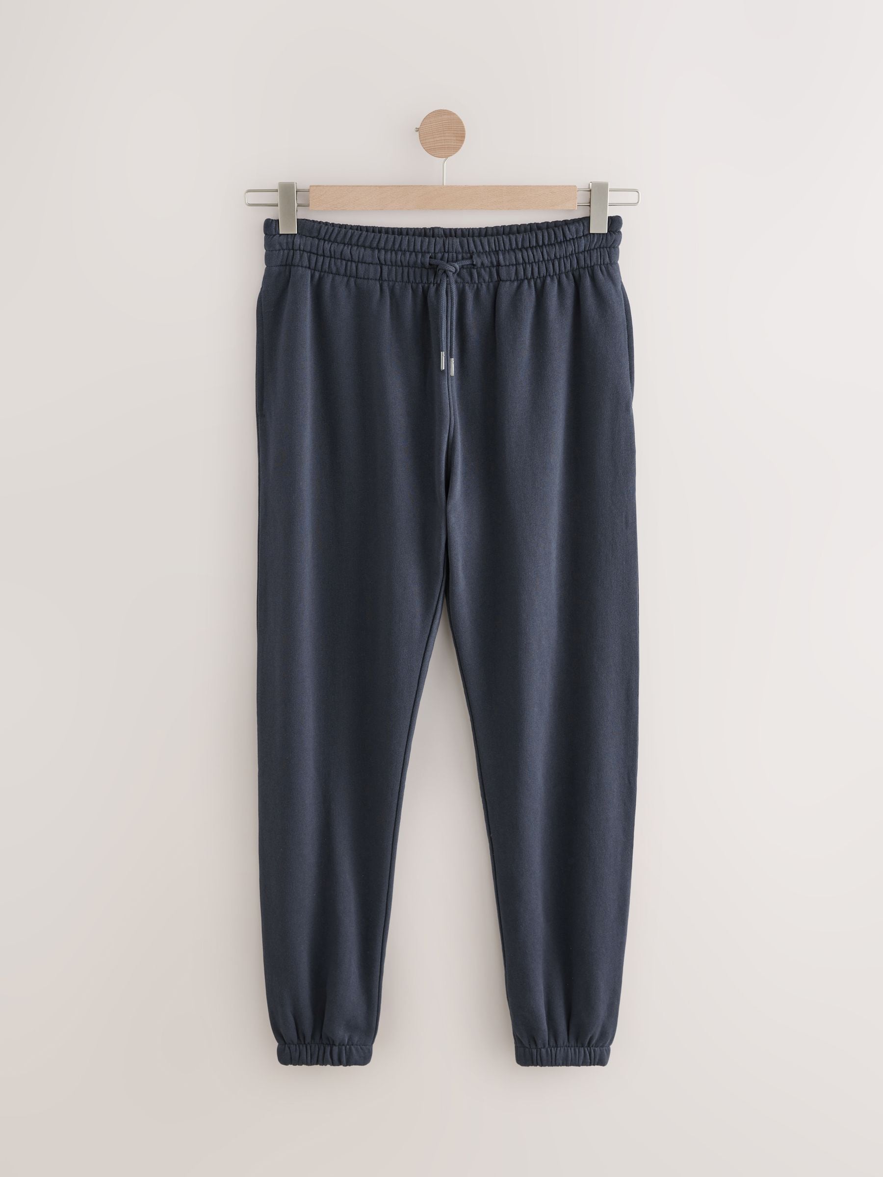 Navy blue jogging pants on sale