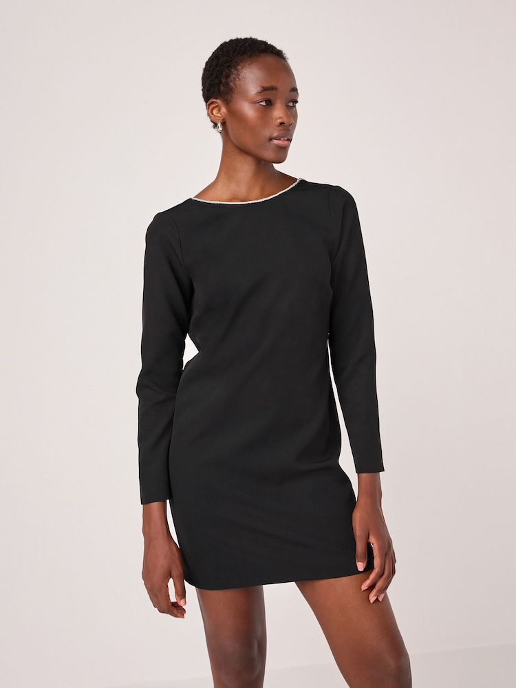 Schwarz - Langarm-Minikleid mit Schleife hinten - Bild 2 von 8 Schwarz - Langarm-Minikleid mit Schleife hinten - Bild 2 von 8
