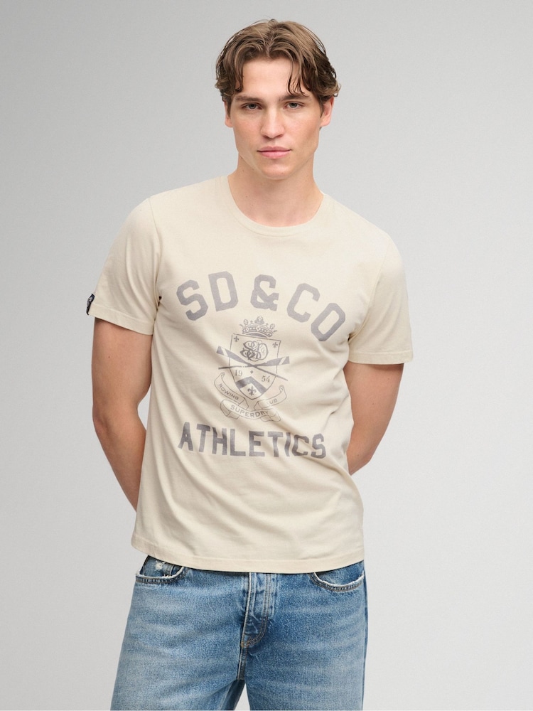 Superdry Cream Gothic Varsity T-Shirt - Image 1 of 6 Superdry Cream Gothic Varsity T-Shirt - Image 1 of 6