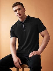 Schwarz - The North Face Poloshirt aus 100 % Baumwoll-Piqué - Bild 1 von 6