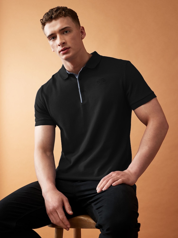 Schwarz - The North Face Poloshirt aus 100 % Baumwoll-Piqué - Bild 1 von 6