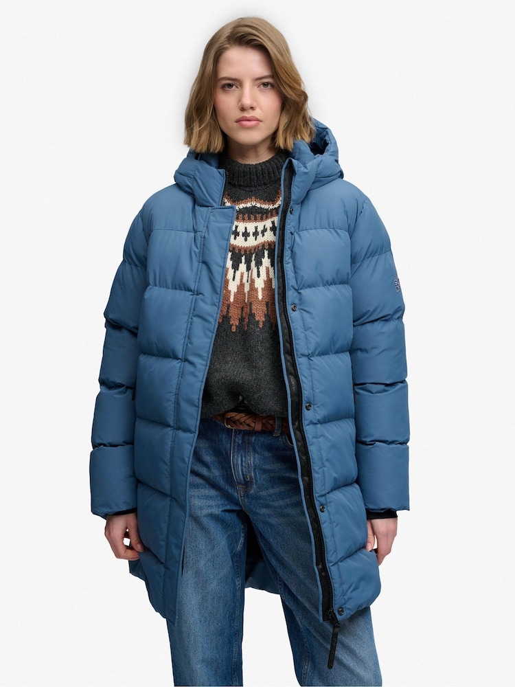 Superdry Blue Hooded Sports Puffer Mid Length Jacket - Image 1 of 9 Superdry Blue Hooded Sports Puffer Mid Length Jacket - Image 1 of 9
