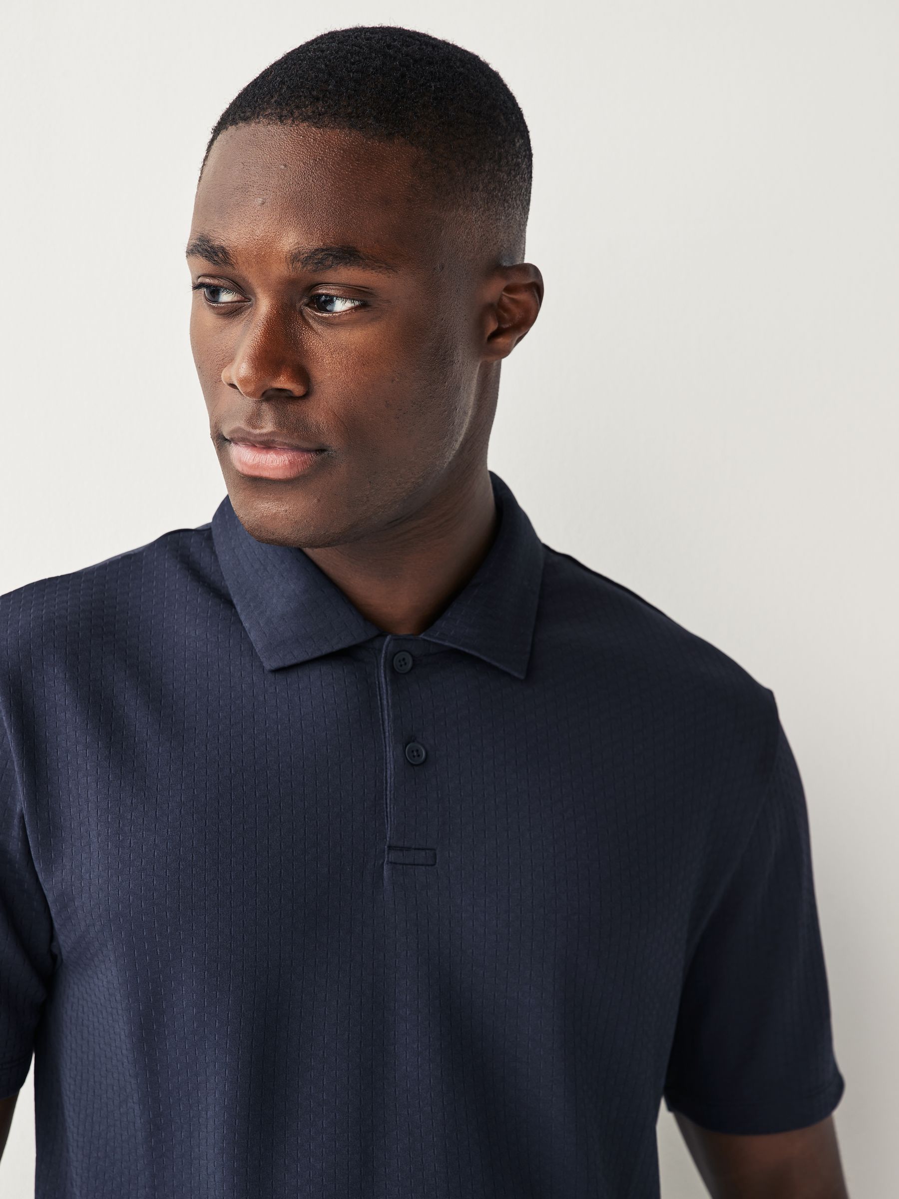 Buy Navy Blue Smart Textured Golf Polo Shirt from Next Luxembourg
