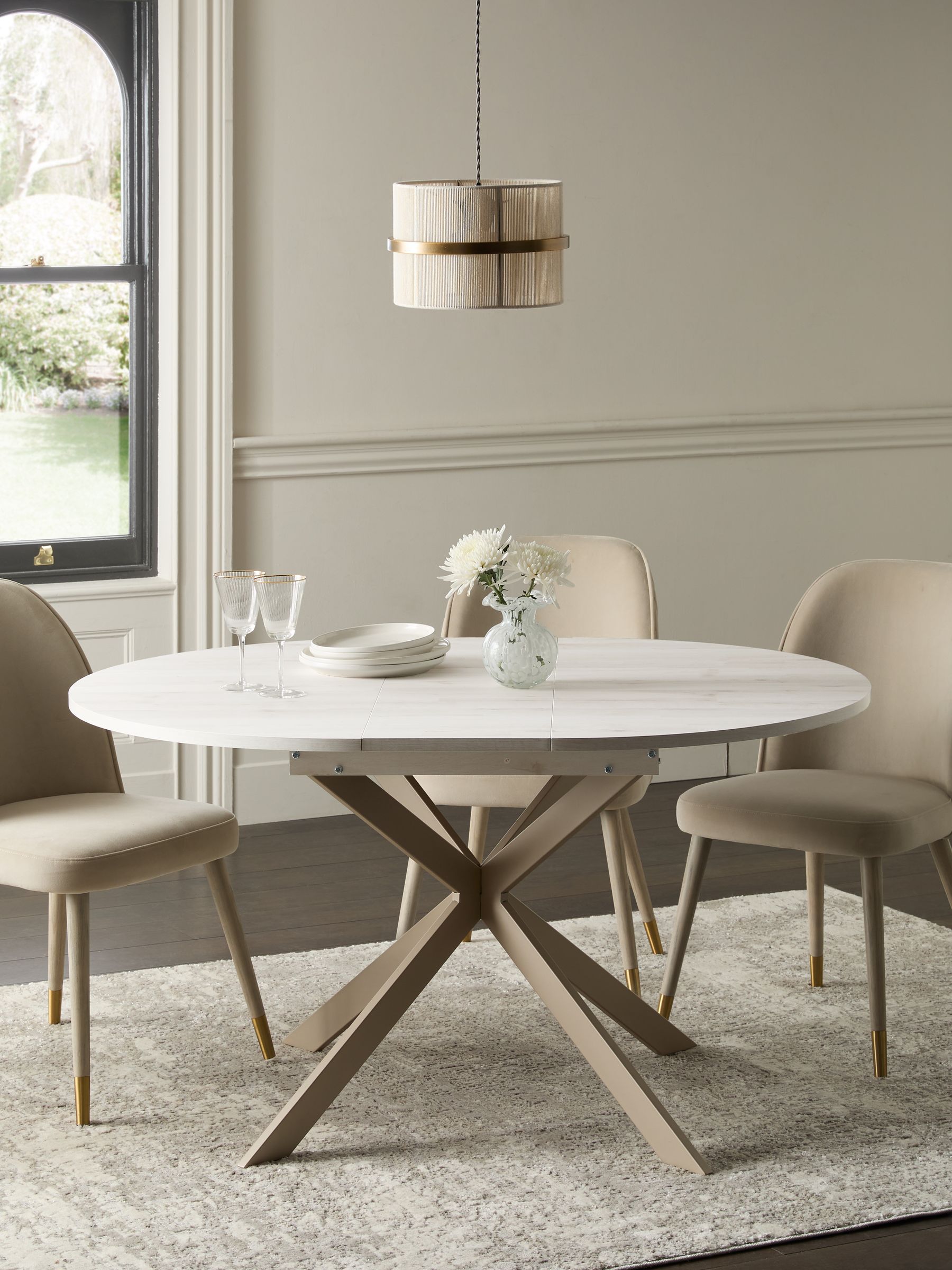 White circular extending dining table sale