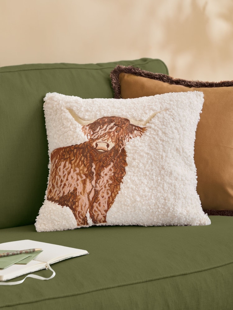 Evans Lichfield Natural Boucle Highland Cow Embroidered Fibre Filled Cushion - Image 1 of 4 Evans Lichfield Natural Boucle Highland Cow Embroidered Fibre Filled Cushion - Image 1 of 4
